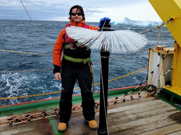 Lamont Oceanographer Pierre Dutrieux in Terra Nova Bay Antarctica with Instrument that Detects Fluctuations in Ocean Water